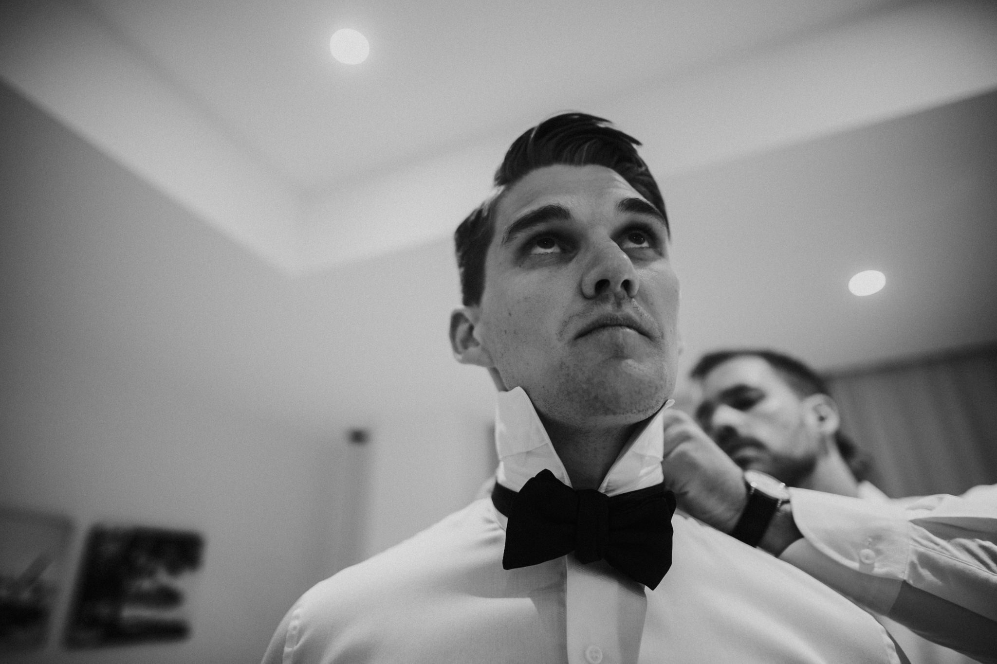 the groom preparing for his wedding