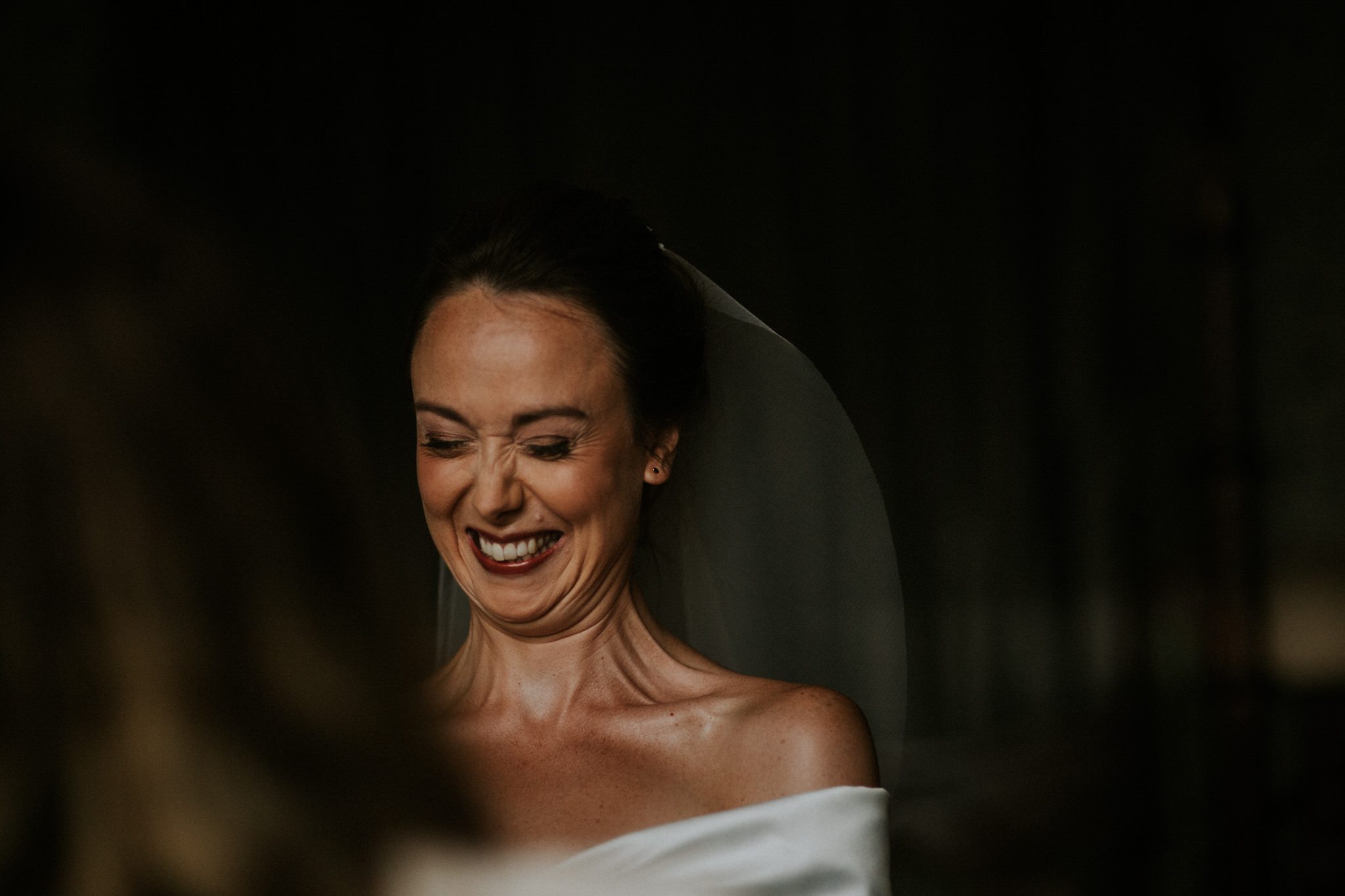 A happy bride in a Devon wedding photograph
