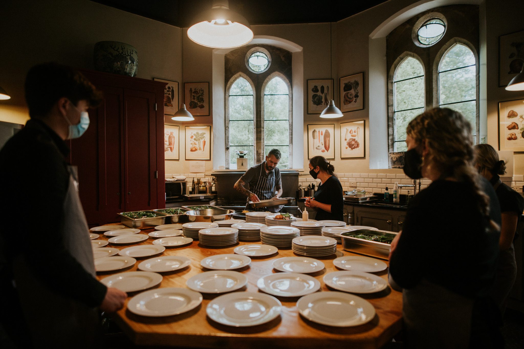 A chef and his team get ready to plate up a wedding breakfast at Huntsham Court in Devon