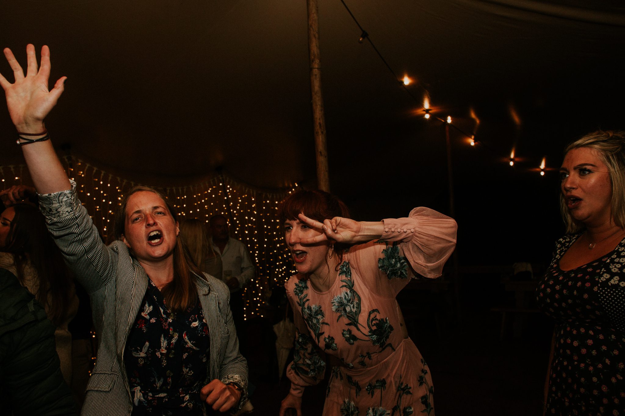 Guests dance at a wedding at Lila's Wood in Hertfordshre