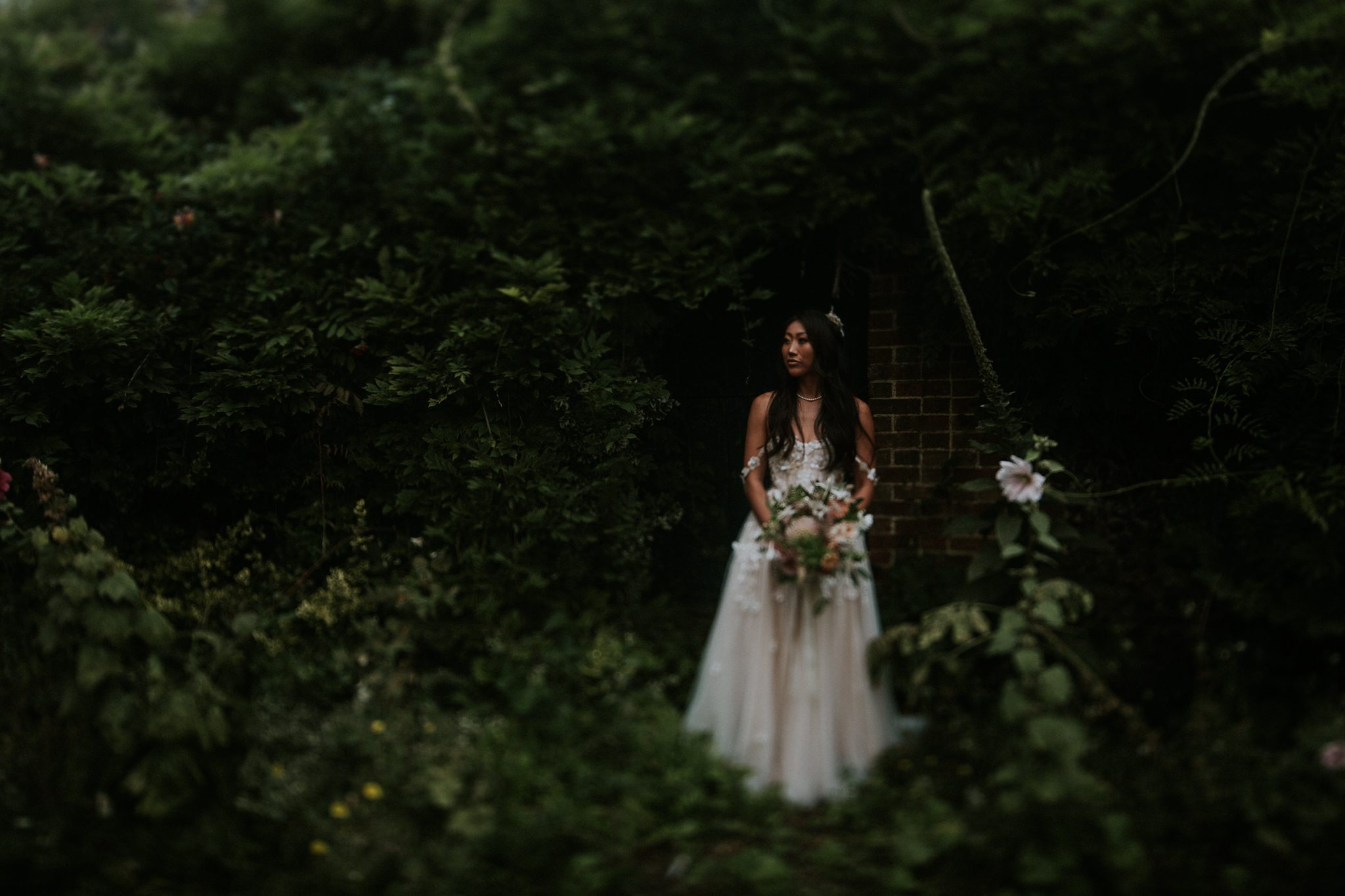 Romantic bridal portrait at a wedding at Upthorne Wood in Suffolk