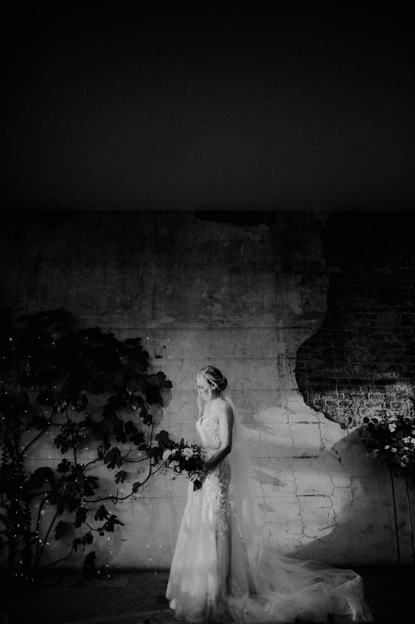 A bride takes a quiet moment after her wedding at Middleton Lodge in Yorkshire