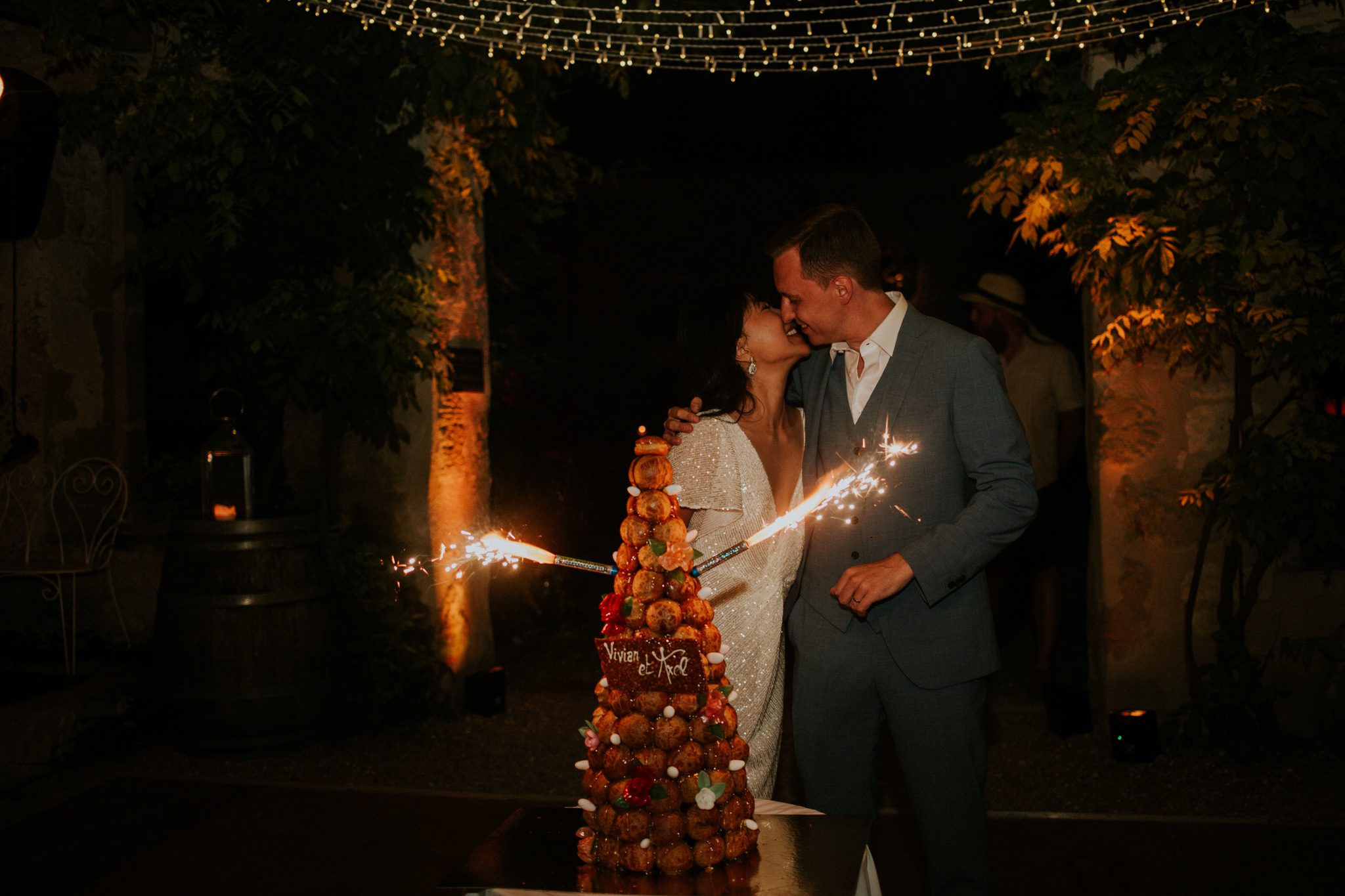 A newly married couple kiss during their wedding reception after their wedding at Chateau St Paul, Marry Me In France