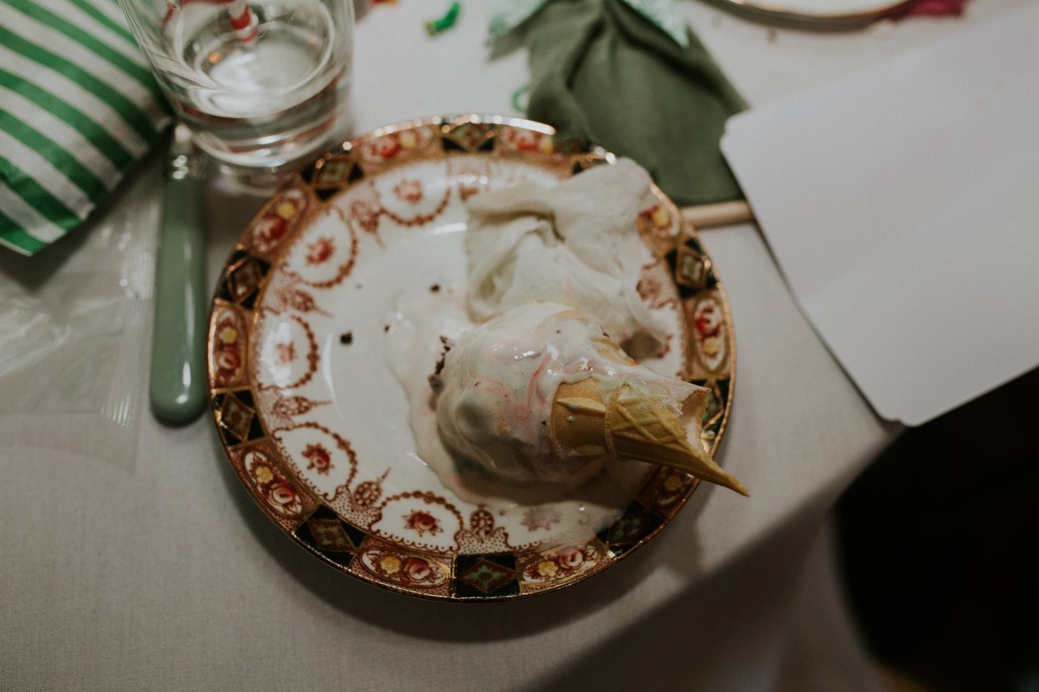 A detail shot of an ice cream cone abandoned on a plate at Scorrier House in Cornwall